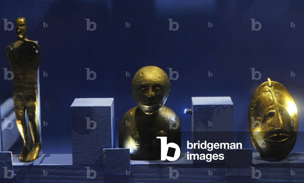 Figurines and face masks for religious worship