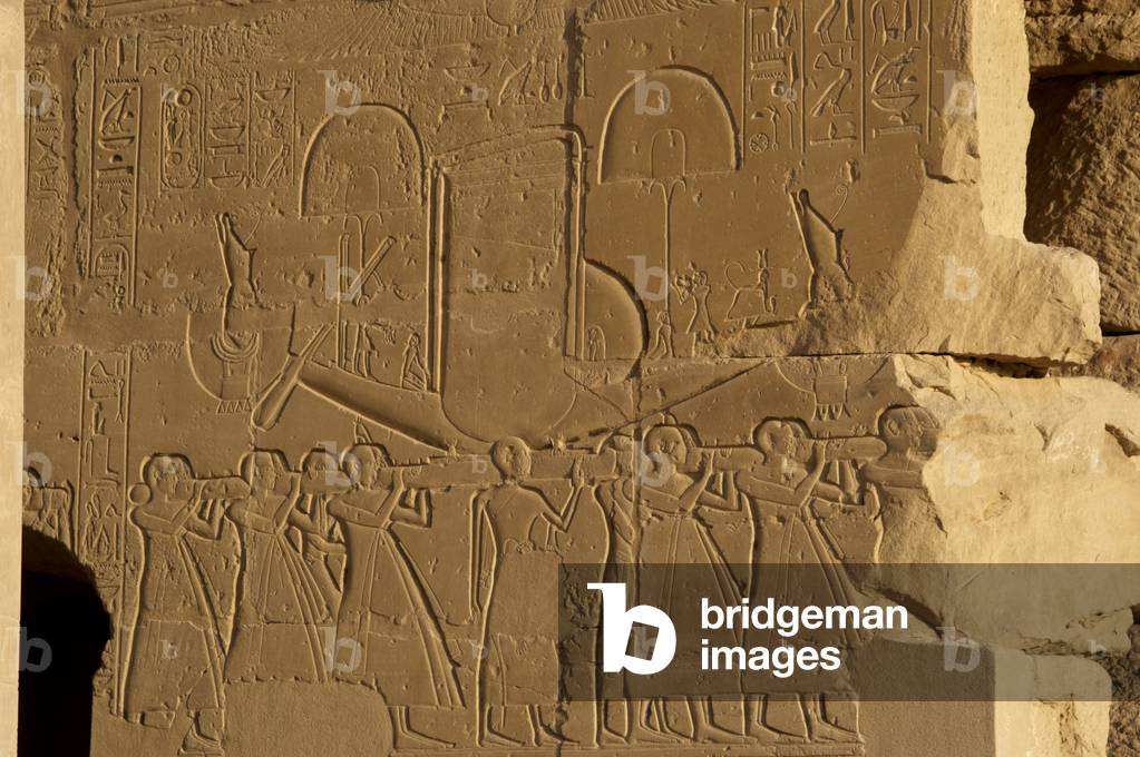 Sacred solar boat carried by priests. Relief. Ramesseum. Egypt.