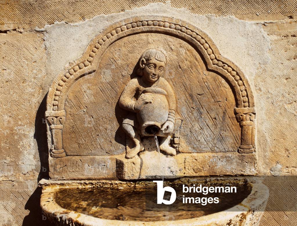 Spain. La Rioja. Casalarreina. Font. Relief of a child with a vessel.