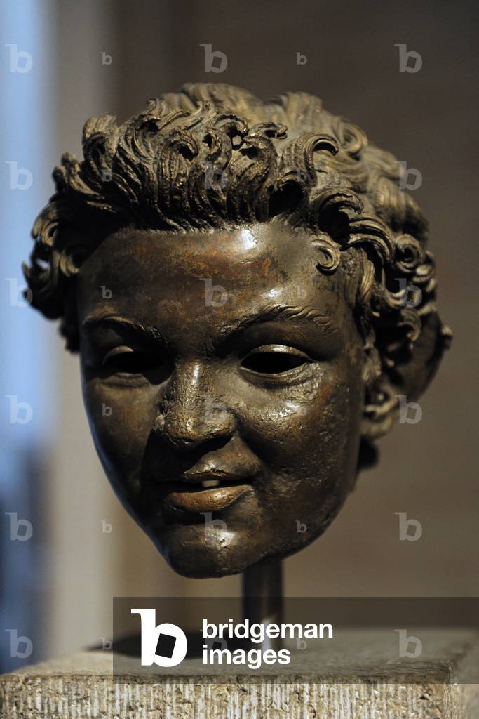 Bronze head from the statue of a satyr. About 100 BC.
