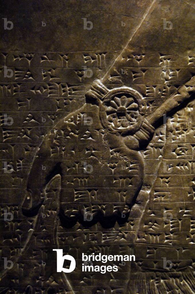 Mesopotamian art. Neo-Assyrian. Relief  panels depicting two protective winged genius. Hand. Dated between 883-859 BC.