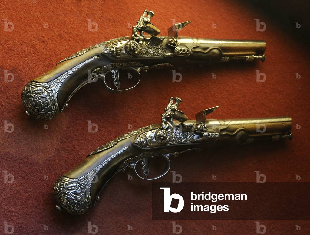Pair of flintlock pistols, c.1650 (steel and wood)