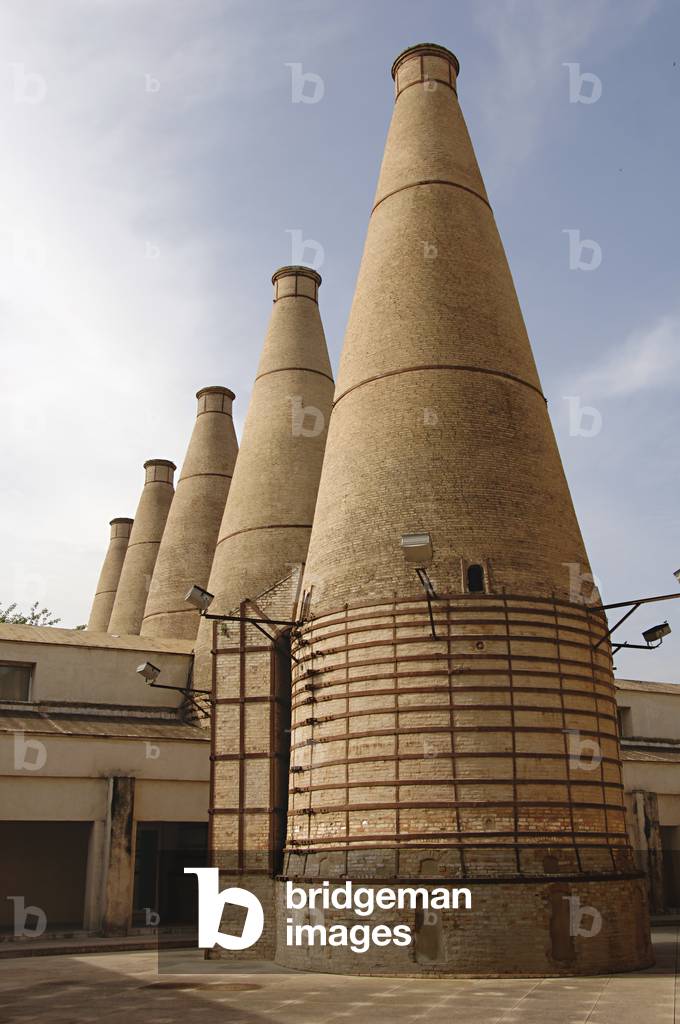 Chimneys of the ceramic tile factory installed in the Monastery of Our Lady of the Caves, Isla de la Cartuja, Sevilla, Andalusia, Spain (photo)