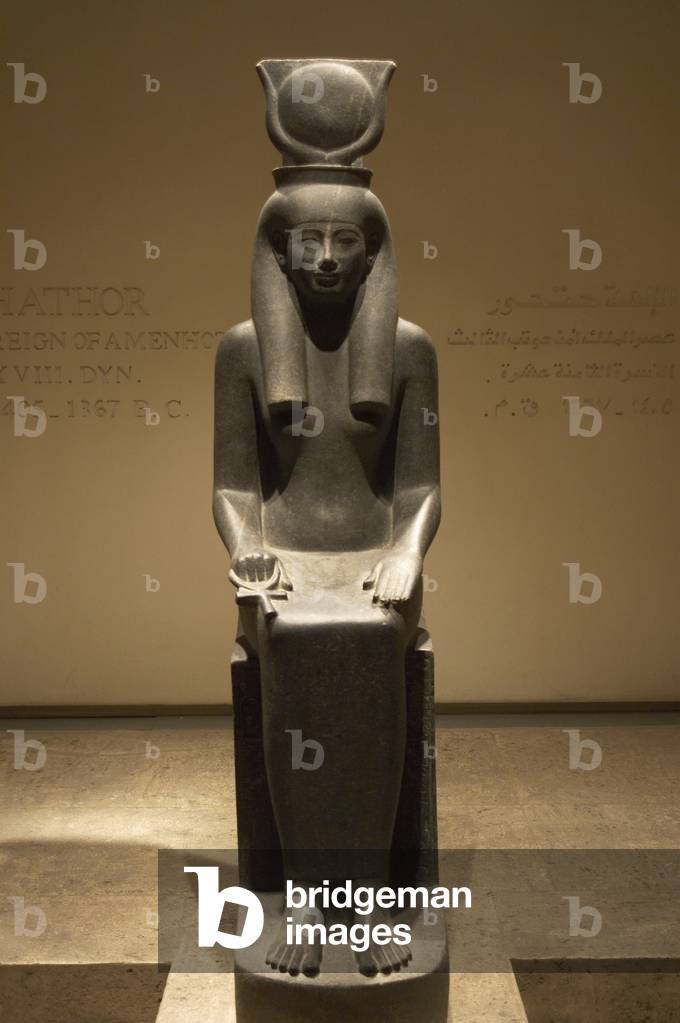 Statue of the goddess Hathor, depicted with cow horns and solar disk. 