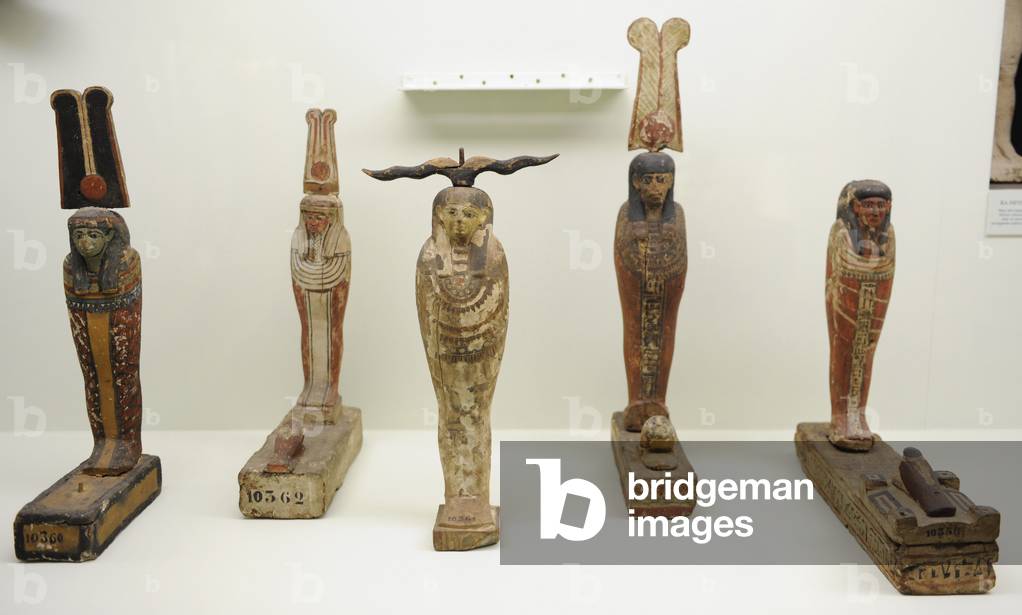 Wooden statuettes depicting Gods Ptah, Osiris and Seker bird. Egypt.