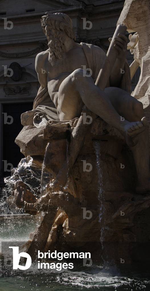 Fountain of Four Rivers, 1651, by Bernini. The river-god Ganges. Piazza Navona, Rome, Italy.