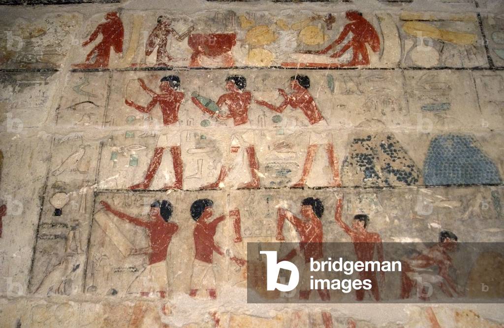 Mastaba of Nefer and Kahay. Polychromed relief depicting agricultural scenes. Farmers filling sacks of grain before a tax collector. Egypt.