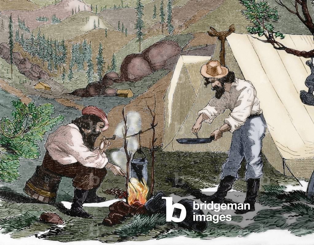 USA. Gold Rush. 19th century. Gold prospectors cooking (colour engraving)