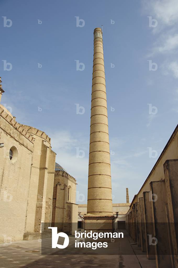 Chimneys of the ceramic tile factory installed in the Monastery of Our Lady of the Caves, Isla de la Cartuja, Sevilla, Andalusia, Spain (photo)