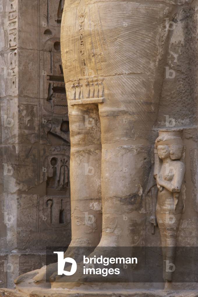 Temple of Ramses III. Great colossal statues of Ramses III deified as Osiris, attached to pillars. Detail. Egypt.