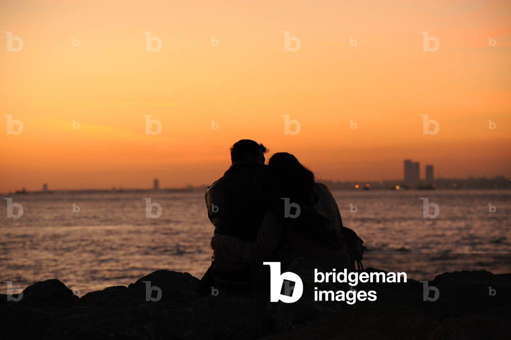 Lovers. Couple looking at the sunset. Istanbul. Turkey.