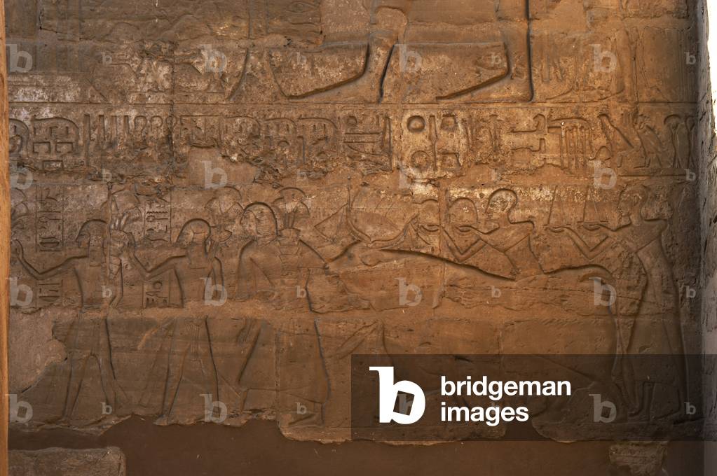 Children of Ramses II carrying flowers. Relief. Luxor temple. Egypt.