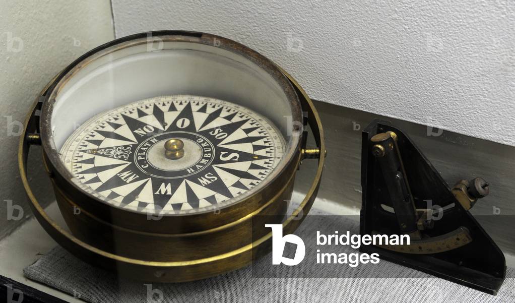 Old navigational instruments. Compass and sextant. 19th-20th centuries.