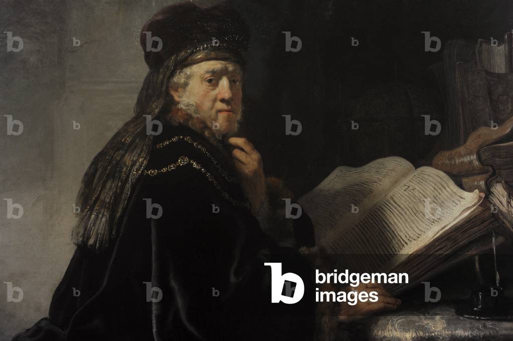 Rembrandt van Rijn (1606-1669). A Scholar in his study or A Scholar Seated at a Desk, 1634.