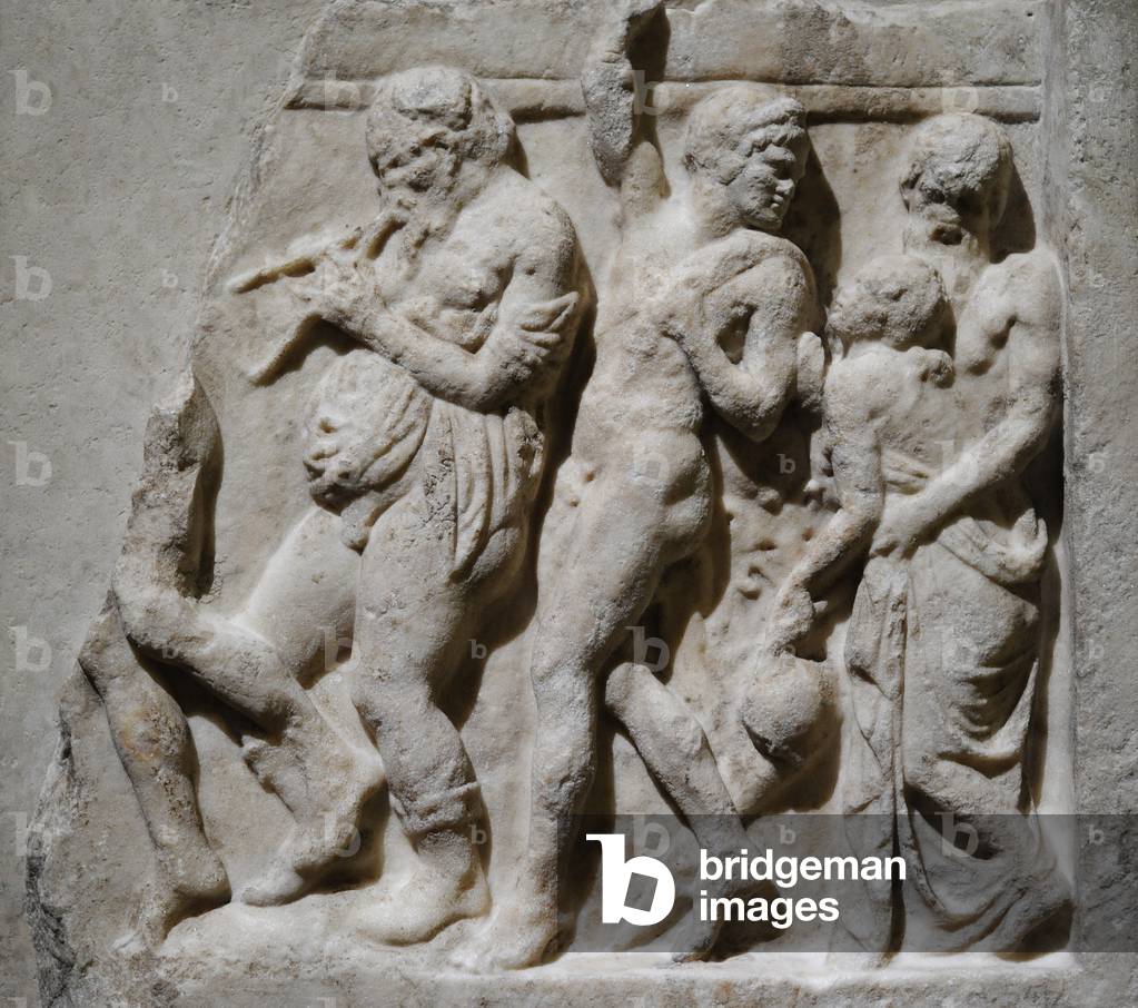 Roman relief depicting Dionysus visiting a drama poet with Silenus, satyrs and a maenad, 1st century BC (marble)