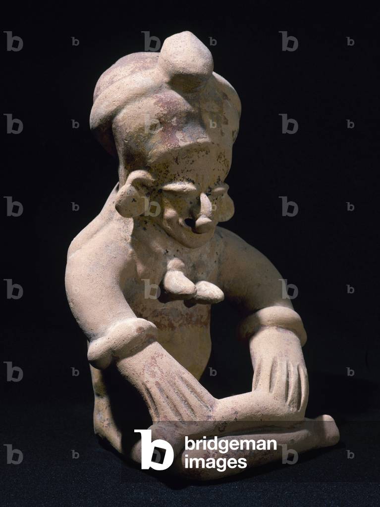 Bahia Culture (Mahia, Ecuador). Figure sitting cross-legged. Period of Regional Development.