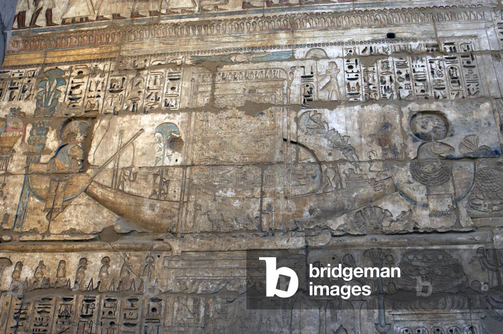 Temple of Ramses III. Sacred solar boat procession. Relief. Egypt.