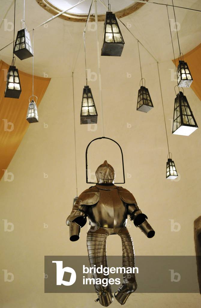 Sweden, Malmo, Museum of the City, Room with lamps and armor hanging from the ceiling