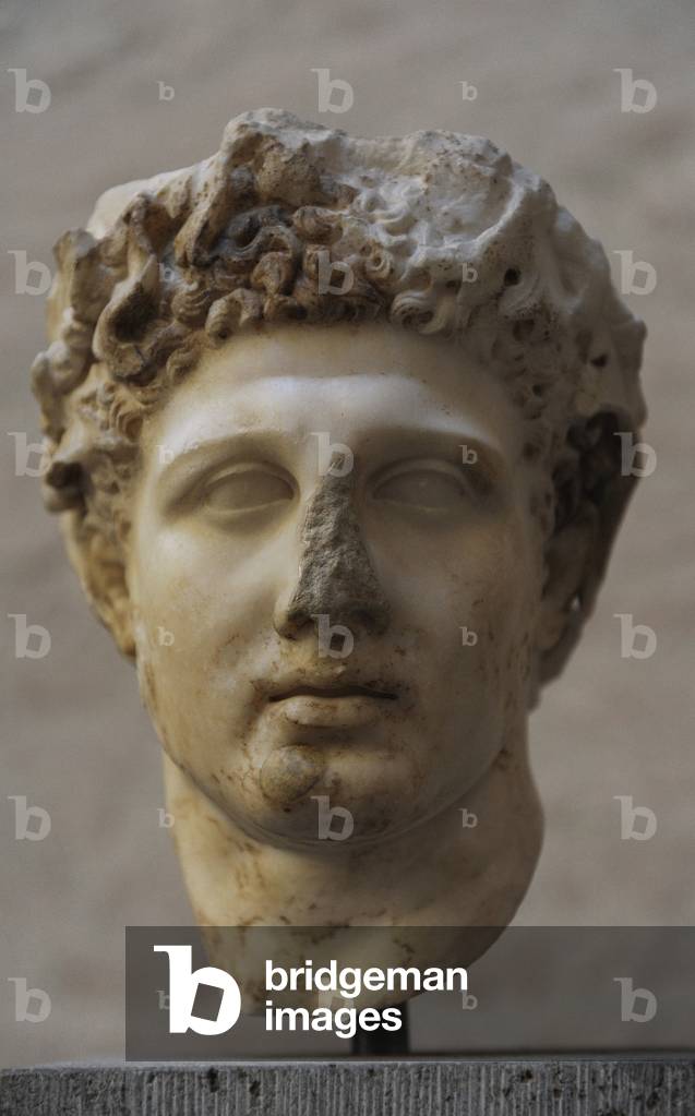 Heracles head with wreath. 4th century BC.