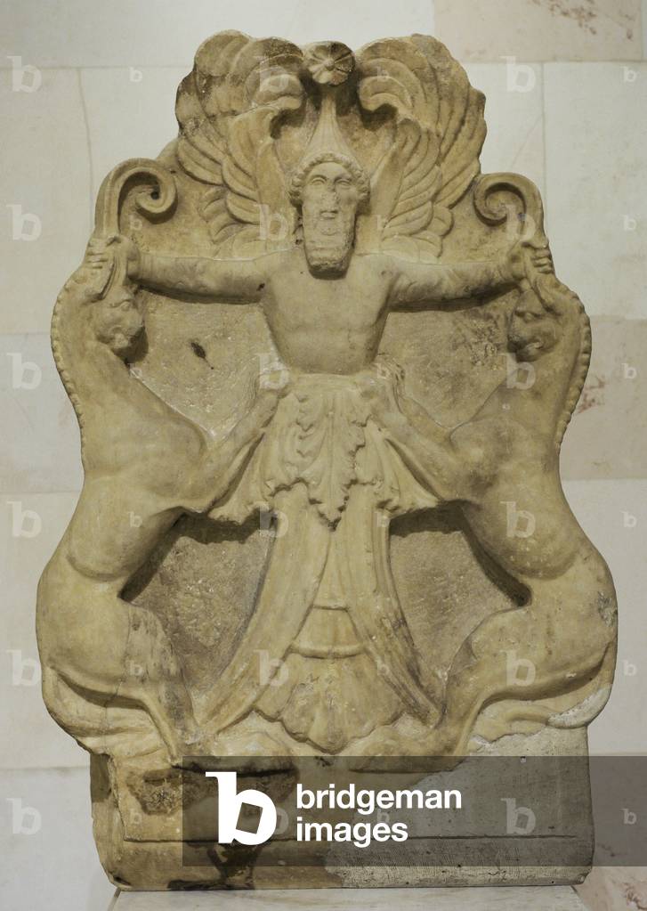 Greek art. Acroterium with a relief depicting Arimaspian (winged-deity) holding griffins by their horns. 3rd century BC. Marble.