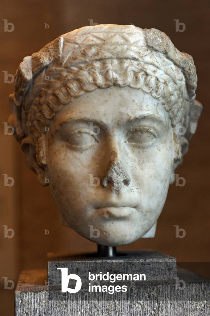Head of a woman, with garland of ears of corn. Pristess. About 140 AD.
