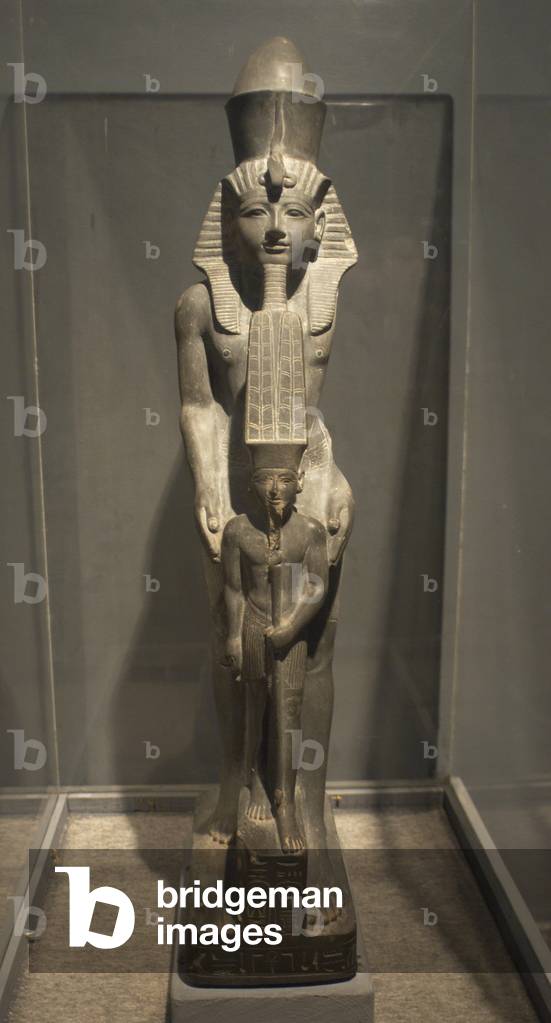 Pharaoh Ramses IV next to god Amun. Egypt.