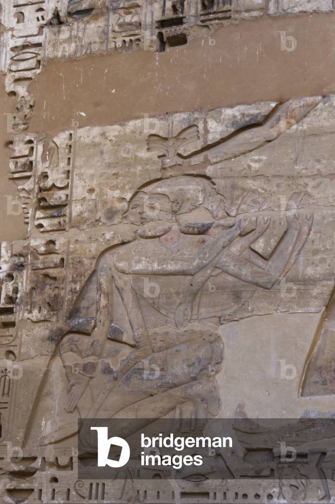 Temple of Ramses III. Relief depicting war prisoners. Egypt.