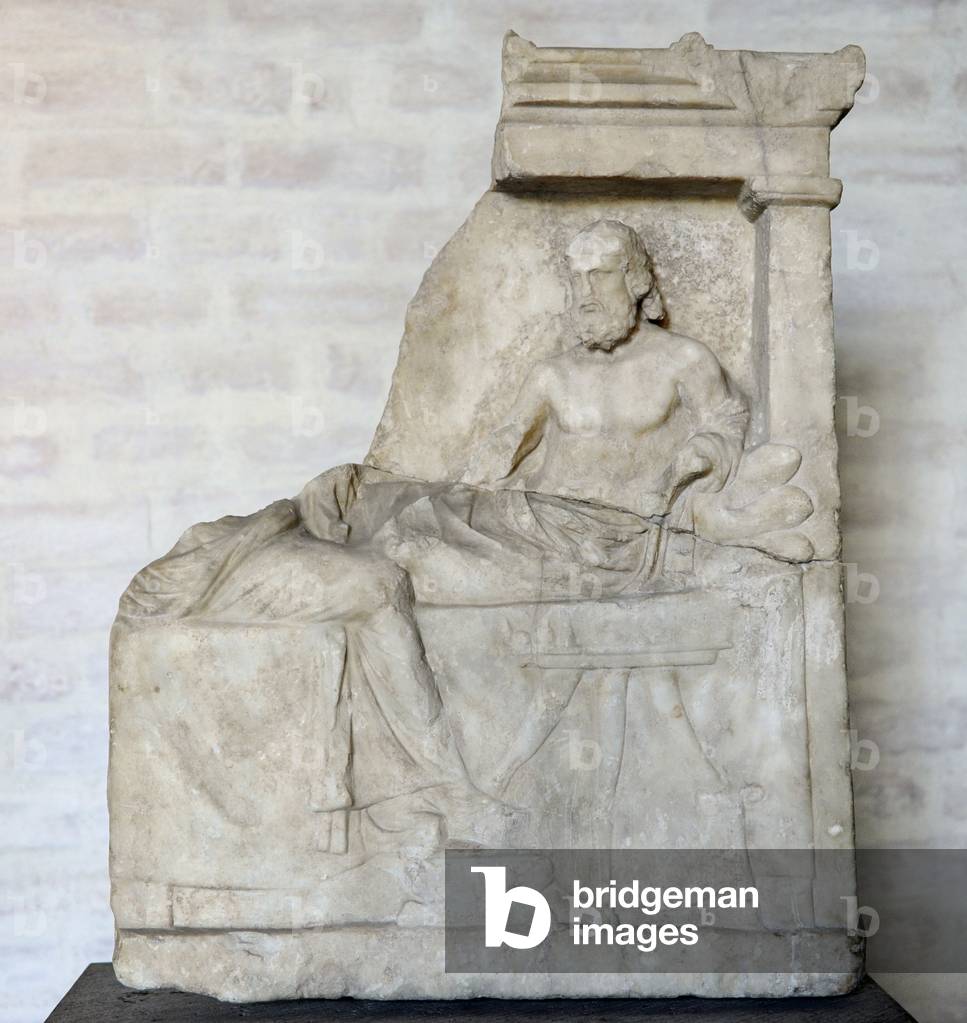 Stele depicting a couple in a banquet. Ca. 340 BC.