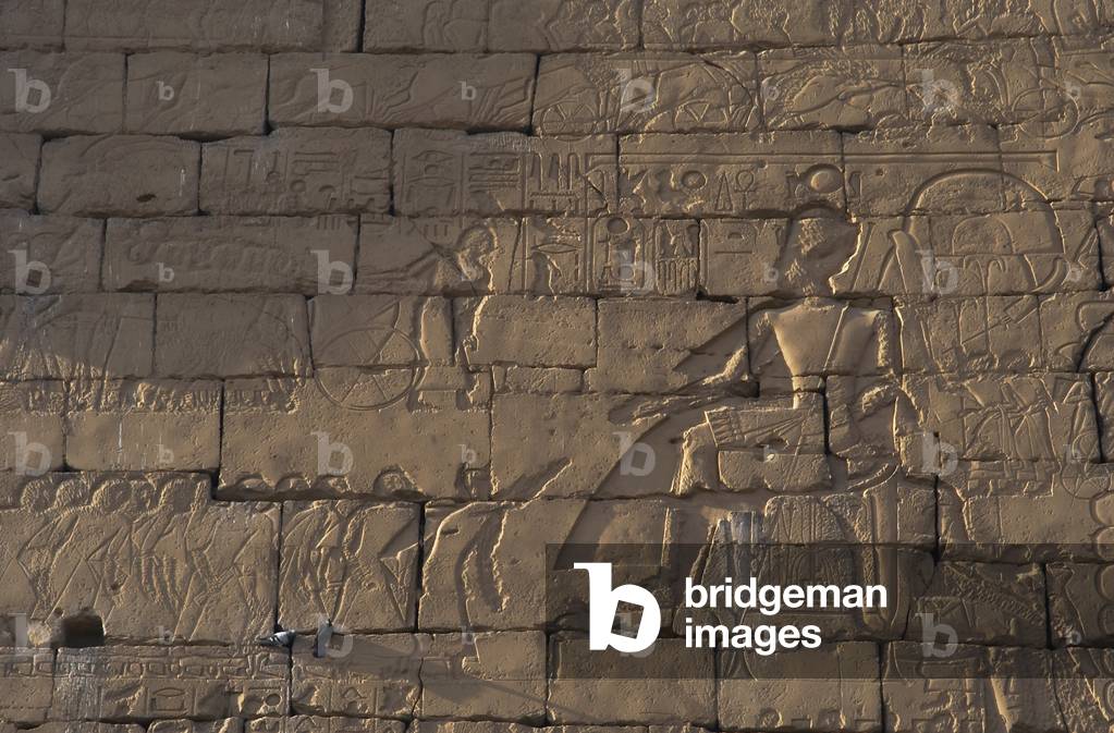 RAMSES II remained seated for a council with his officers, during the military campaign against the Hittites. Relief.