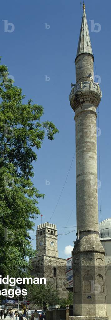 Turkey. Antalya. Old city center. Minaret of Tekeli Pasa Mosque (18th century) and clock tower. Mediterranean coast.