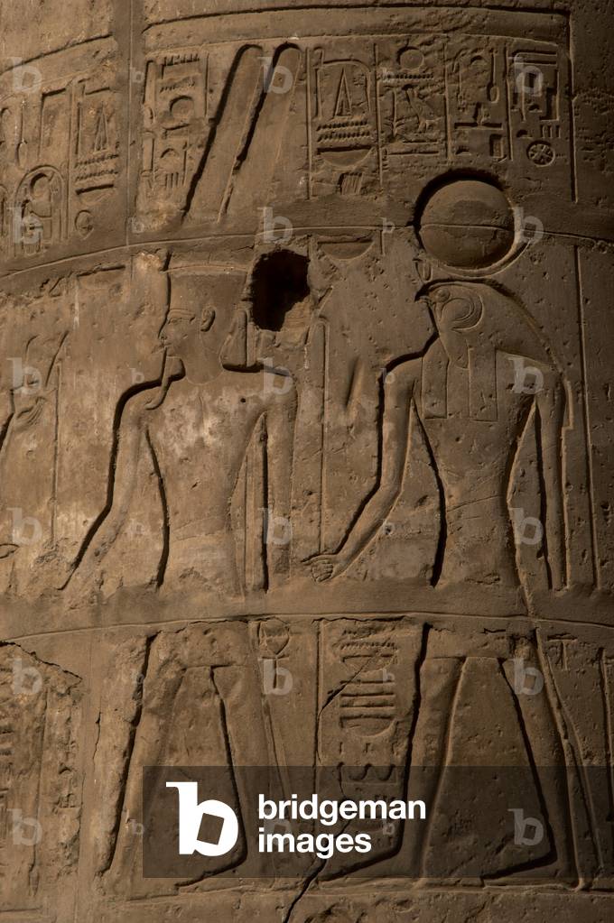 Egyptian relief with Amon and Ra. Luxor Temple. Egypt.