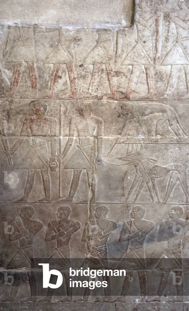 Egypt. Saqqara. Mastaba of Mereruka. Polychrome relief depicting Offering bearers with a monkey and jackals.