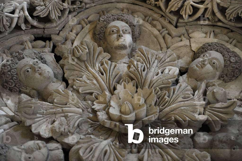 Stucco dome of the diwan: between the acanthus leaves are set six busts, male and female, Hisham's Palace, 8th century AD, Khirbat al-Mafjar, near Jericho