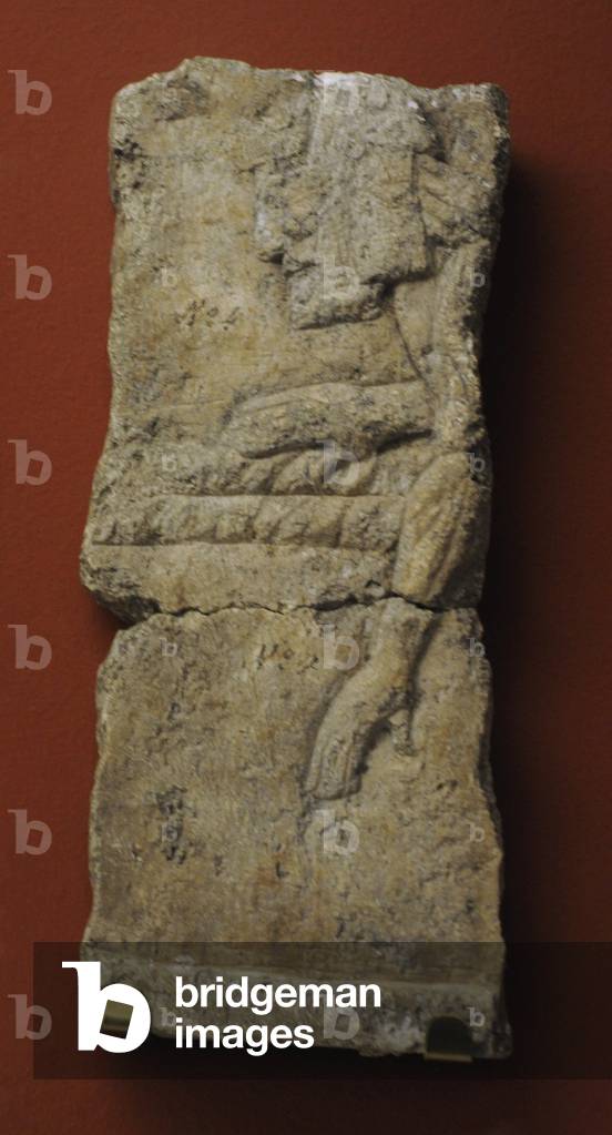 Assyrian Empire. A man hauling the weight. Transport of a colossal sculpture. Palace of Sennacherib at Nineveh (Kuyunjik). Limestone. Early 7th century BC.