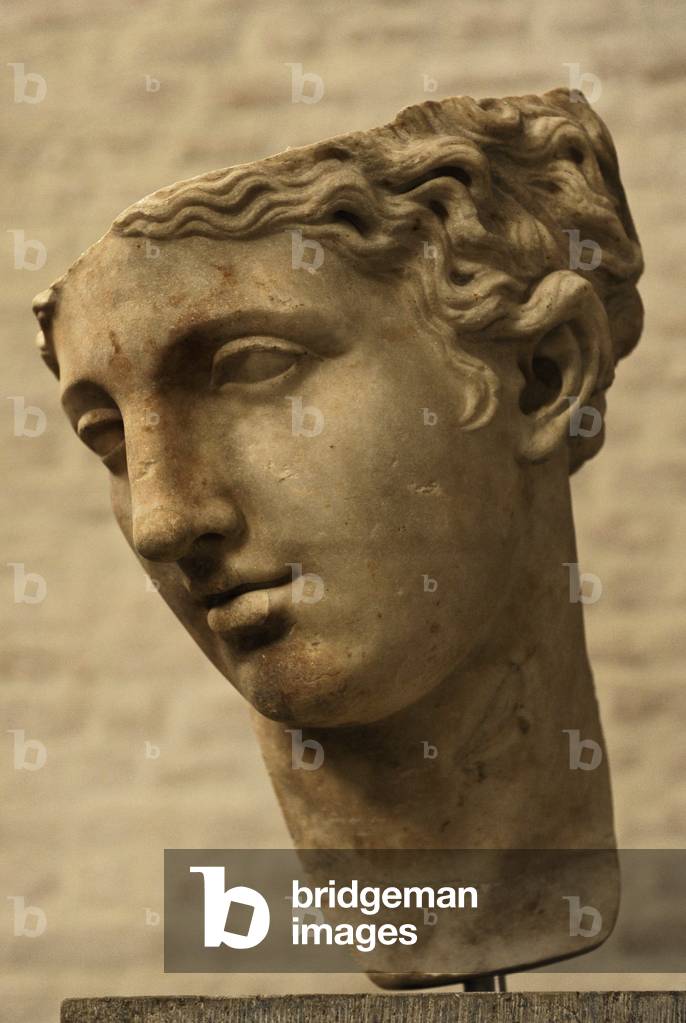 Detail of a head of the statue of a goddess. Roman copy.