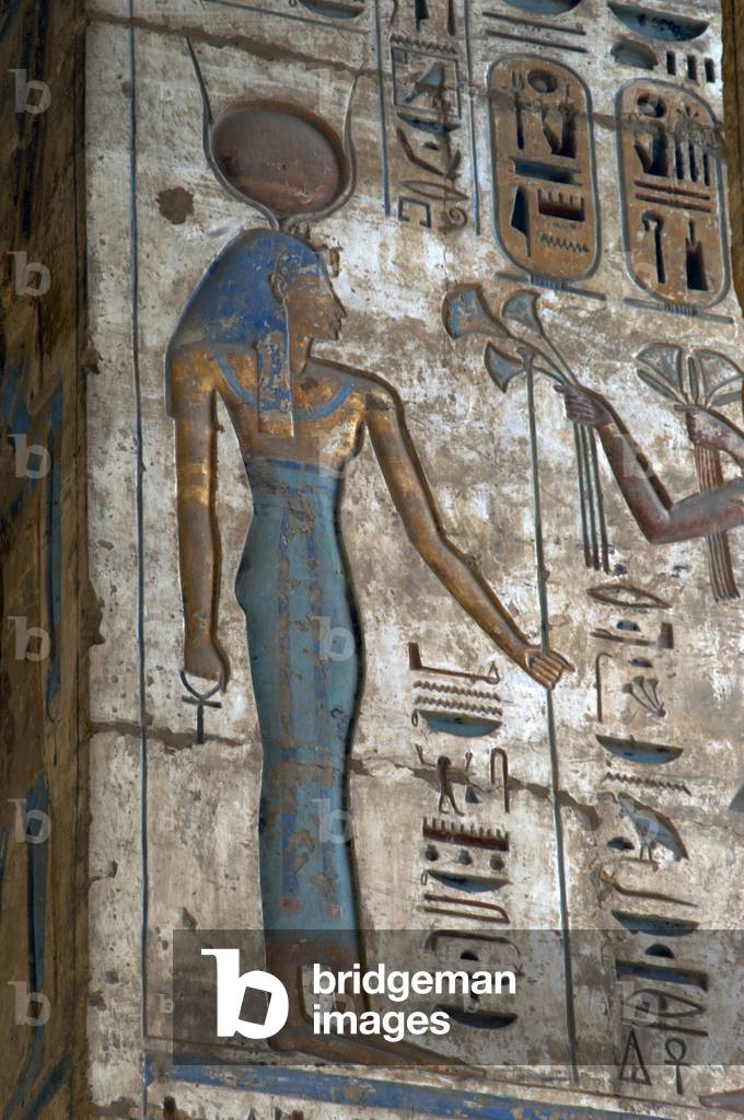 Temple of Ramses III. Egyptian deity. Relief. Egypt.