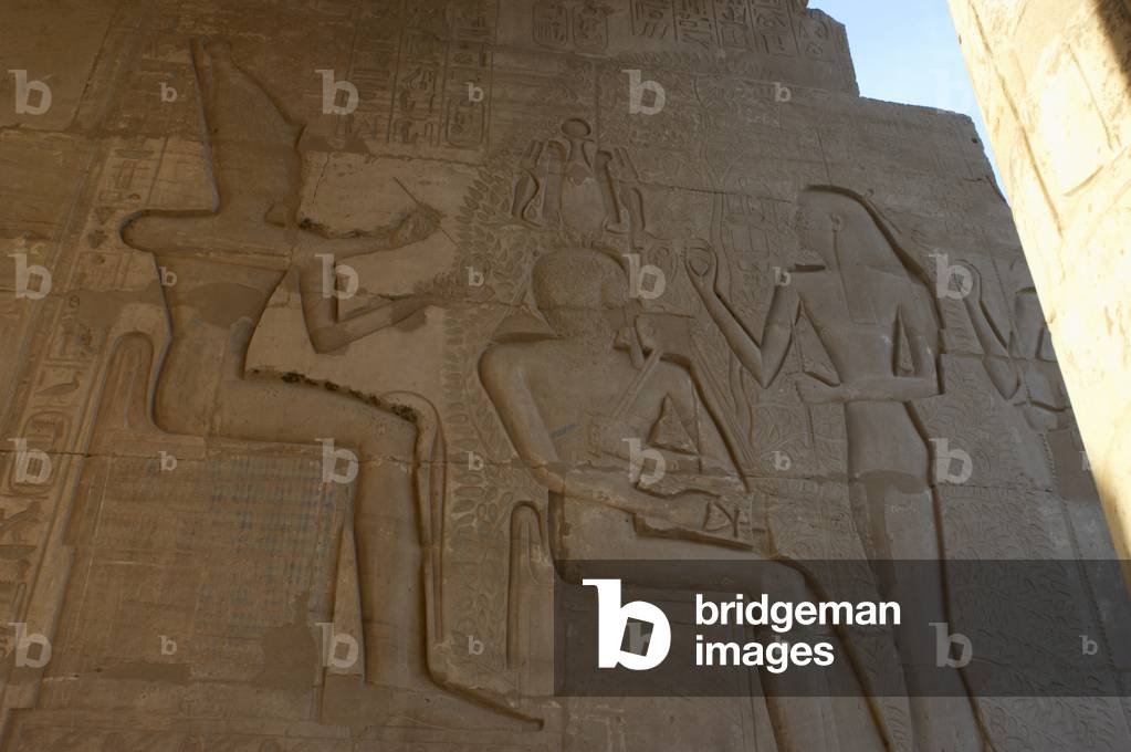 Ramesseum. Relief depicting the pharaoh Ramses II before god Seshat. Egypt.