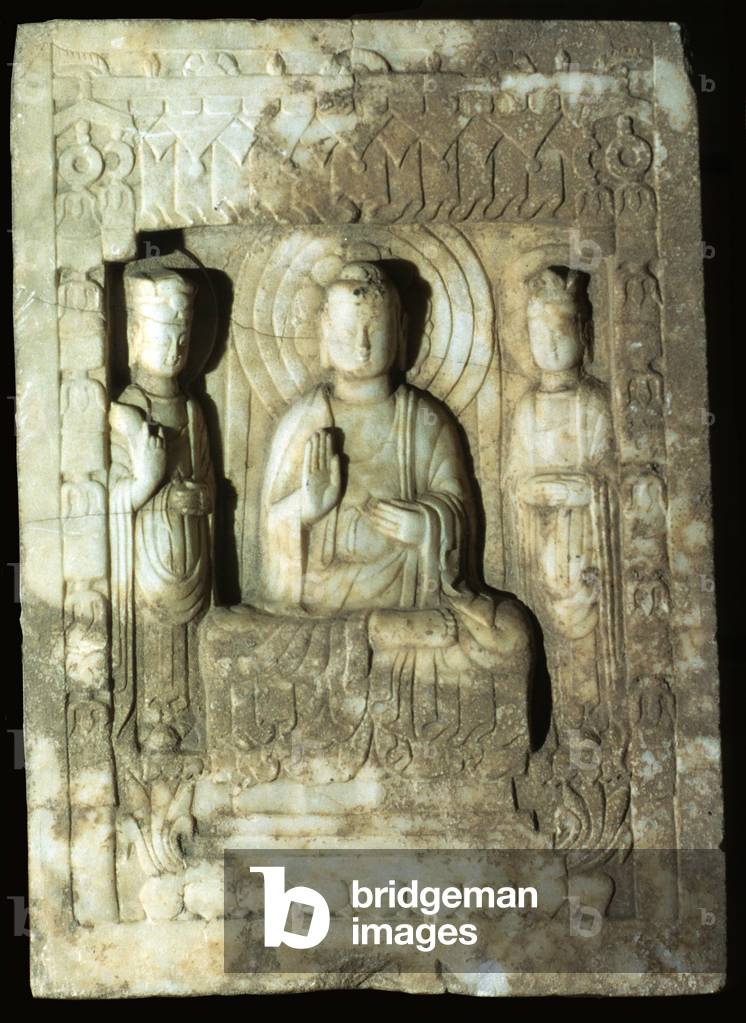 Stele representing the Buddha surrounded by his two attendants, 618-907 (limestone)