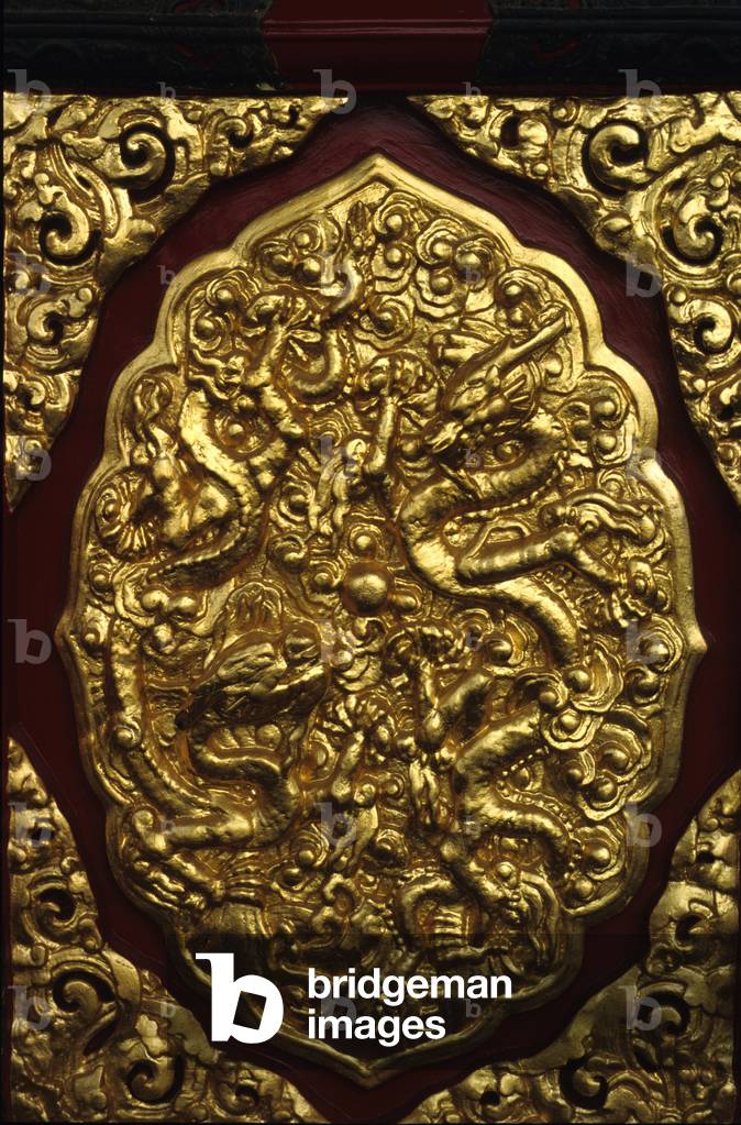 Wooden medallion with a bottom door of the Palace of the Supreme Harmony. Prohibited Quote of Pekin (Beijing), China.
