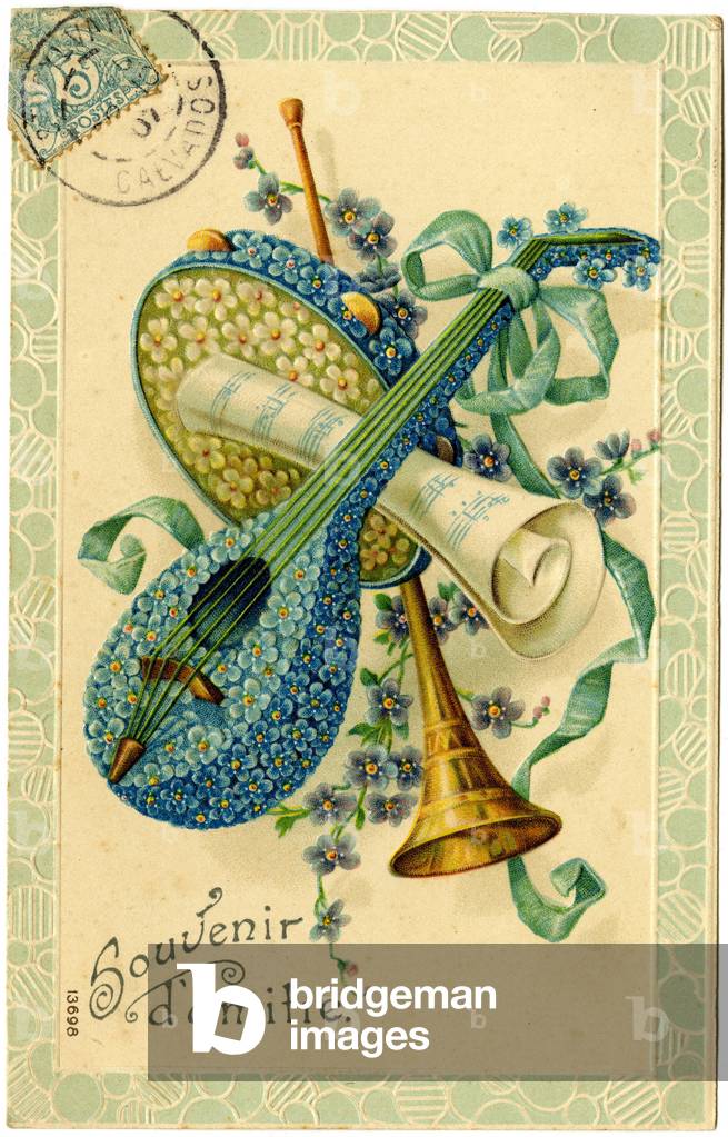 Greetings of friendship with floral musical instruments and score. Postcard beginning of the 20th century.