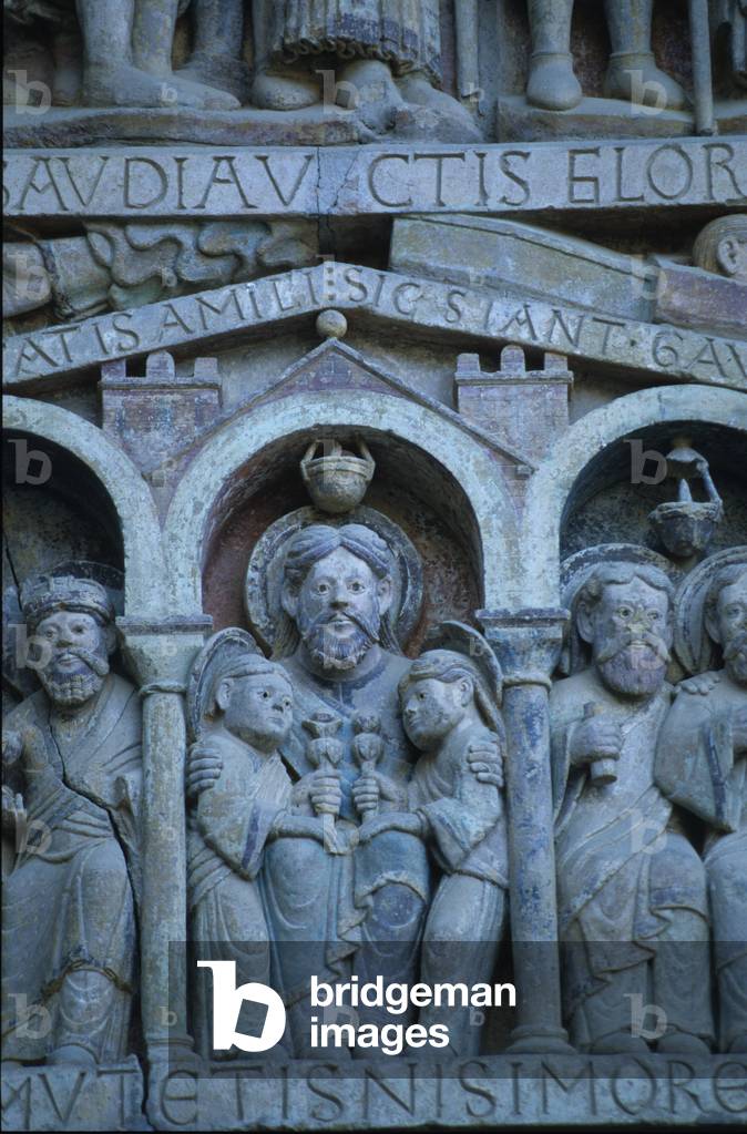 Romanesque art: Abraham, holding two children in his arms, seat in Paradise. Detail of the eardrum of the abbey Sainte Foy (Sainte-Foy) of Conques representing the Last Judgement (11th and 13th century). Aveyron (12).