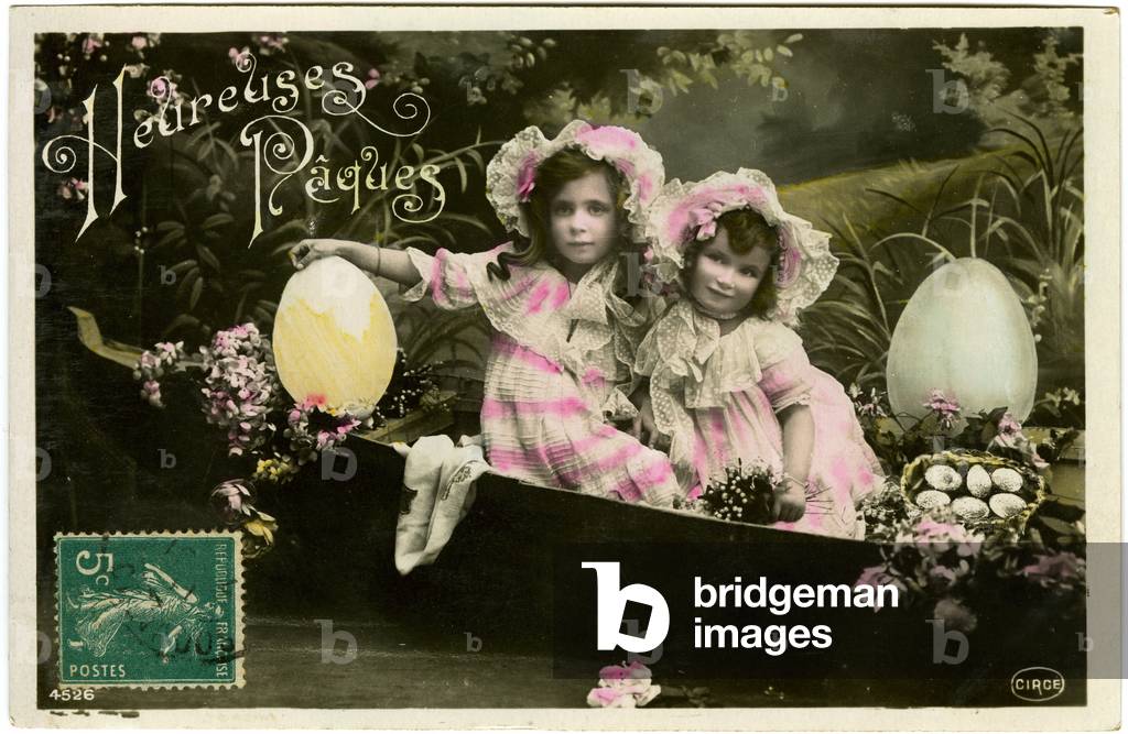 Happy Easter: two girls in a boat. Postcard beginning of the 20th century.