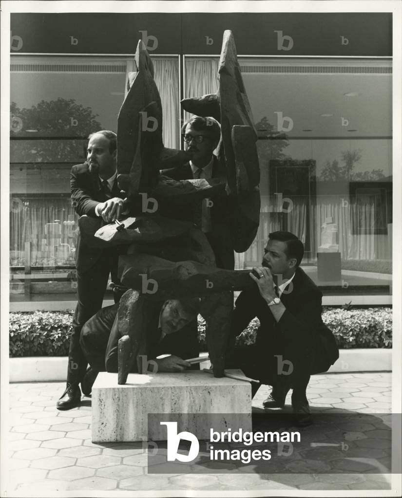 New Percussion Quartet posing with sculpture, outdoors, 1966