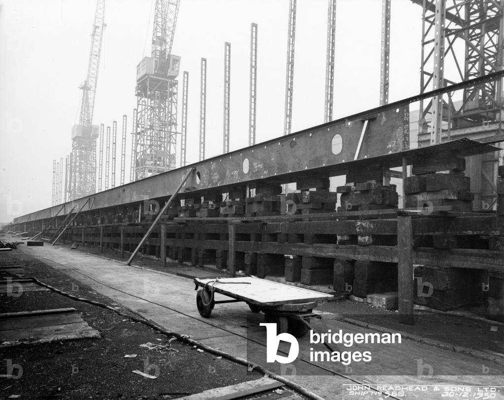 Laying a ship's keel at Readhead's shipyard, South Shields, UK, 1950 (b/w photo)