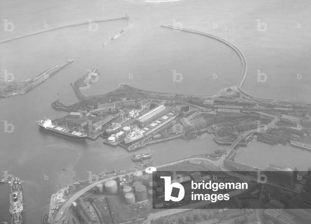 Aerial view of the dry docks and ship repairing yard of T.W. Greenwell & Company Ltd, South Dock, Sunderland, UK, 1962 (b/w photo) 
