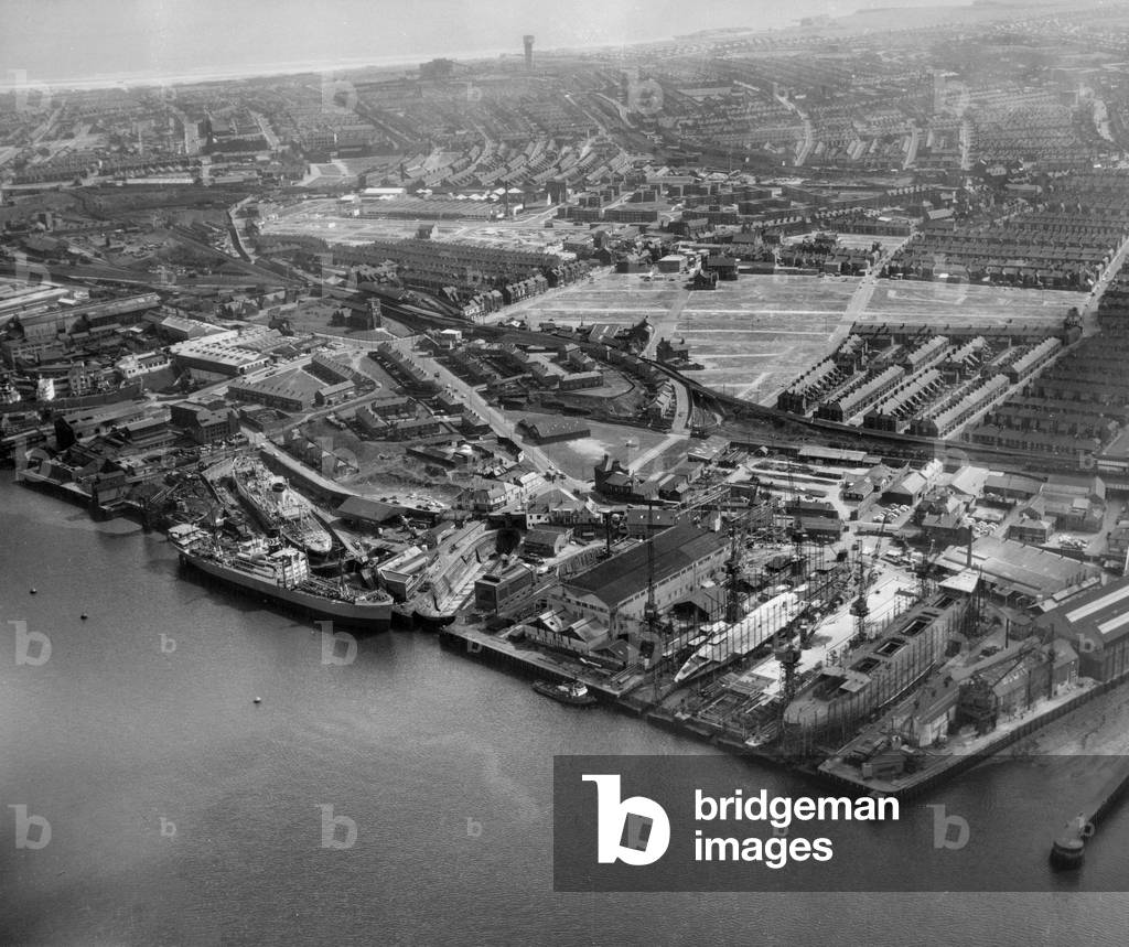 Aerial view of the shipyard of John Readhead & Sons, South Shields, UK, 1963 (b/w photo)