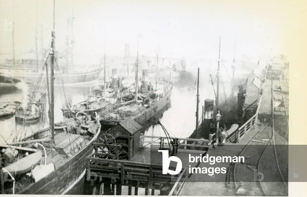 View of Blyth Harbour looking downstream with many vessels waiting to load (b/w photo)