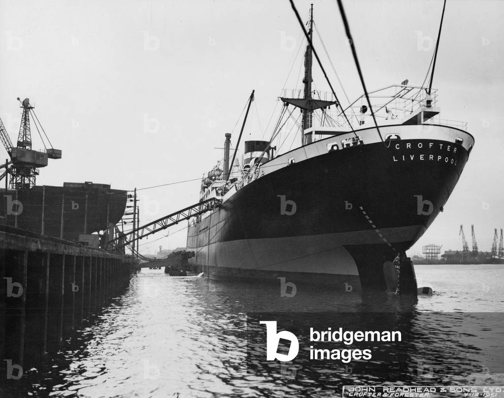 The cargo ship Crofter at Readhead's jetty, South Shields, UK, 1951 (b/w photo)