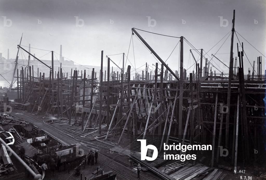 The ice-breaking train ferry steamer 'SS Baikal' in frame during construction by Sir W.G. Armstrong Mitchell and Co. Ltd., at Low Walker shipyard, Newcastle upon Tyne in 1896, Yard No. 647, Lake Baikal (b/w photo)