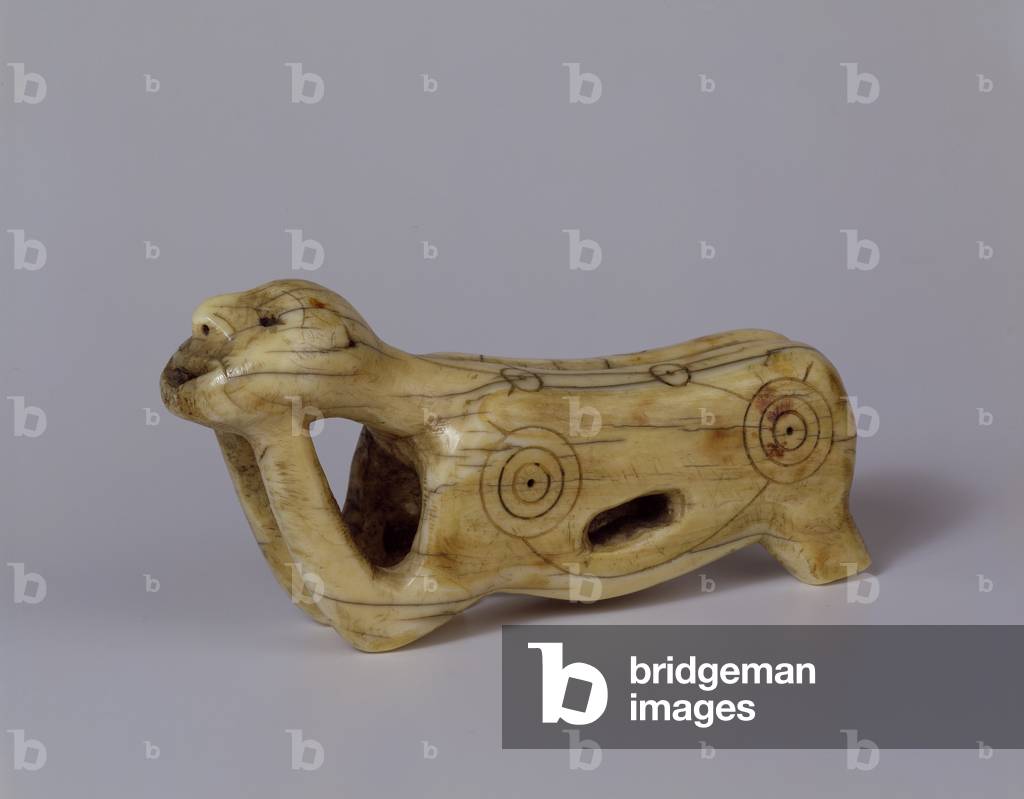 Crouching figure, from Alaska (walrus ivory)